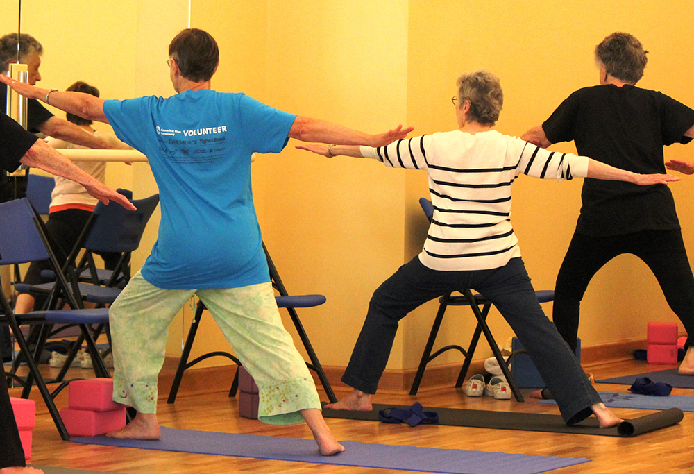 Resident take yoga class