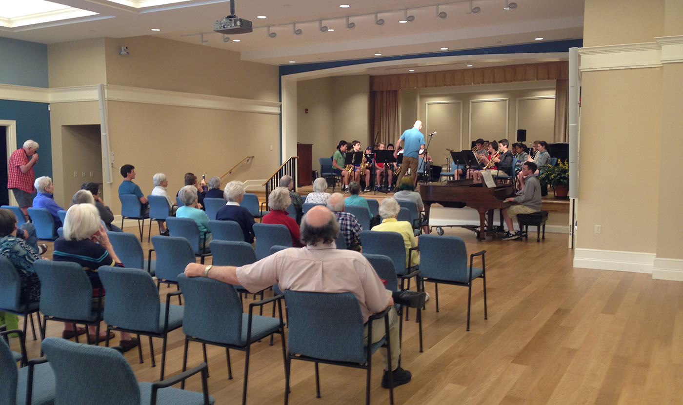 Students perform in Gathering room